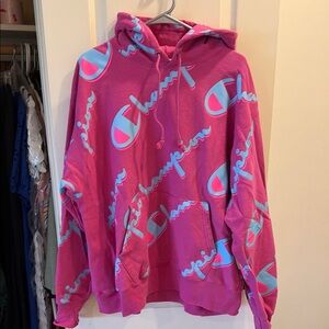Champion Pink Hoodie with Light Blue Logo Print